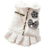 Coco step aside! Paris couture for your baby bling! So chic. All of the embellishments your little boo bug could wish for! Pearls and gold trim accentuate this little tweed charmer. Channel your Chanel and step out in style!