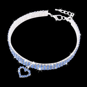 Collar Necklace with Three (3) Rows of Rhinestones and Rhinestone Heart Pendent. Absolutely Beautiful! Buy one for yourself as a bracelet.
